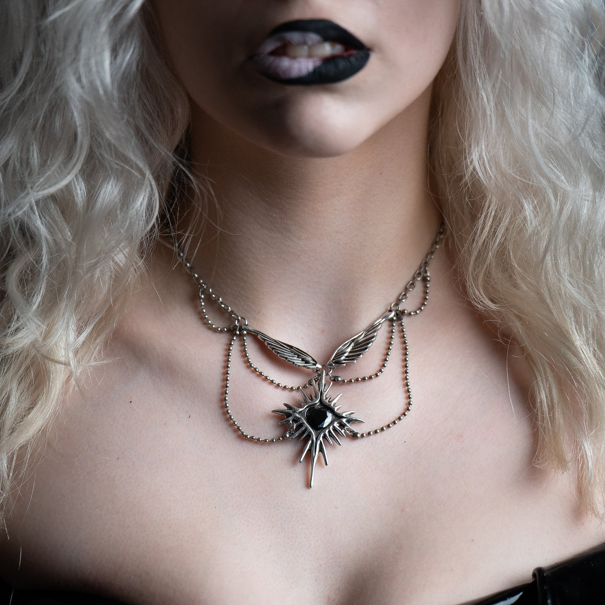 CELESTIAL STARBURST WINGS NECKLACE