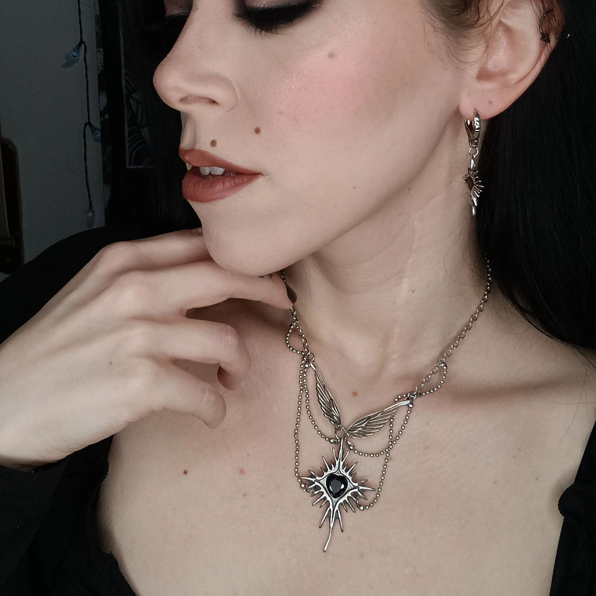 CELESTIAL STARBURST WINGS NECKLACE